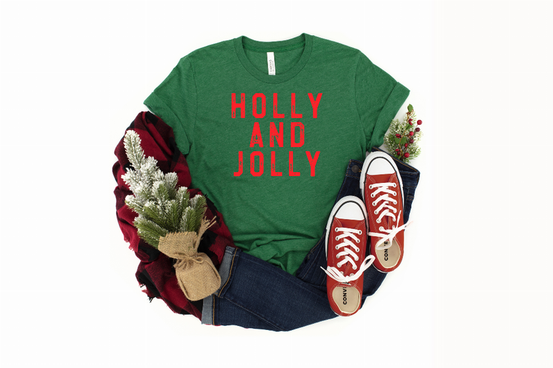 Green short-sleeve T-shirt featuring red 'HOLLY AND JOLLY' lettering