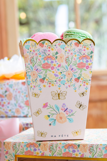 Floral paper treat holder with scalloped top, butterflies and flowers, holds two treats