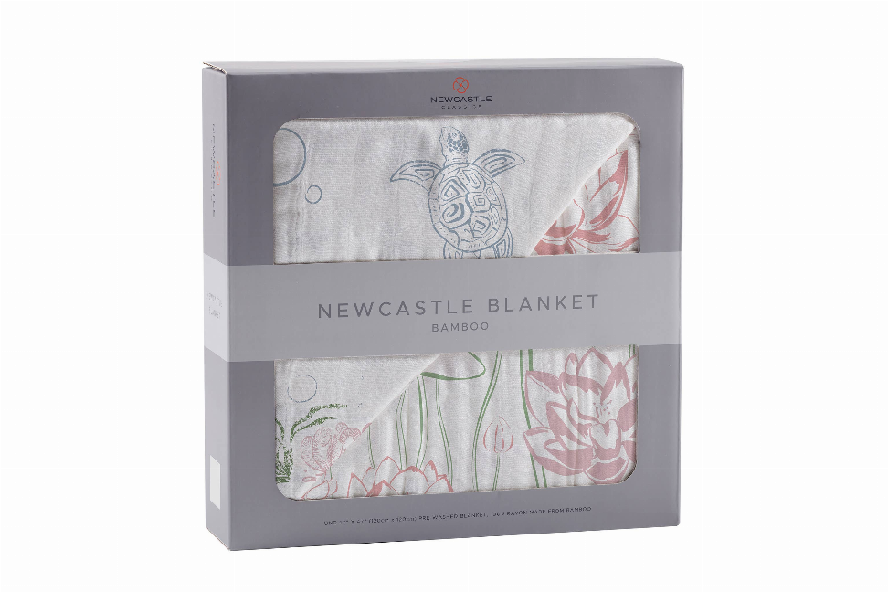 Bamboo blanket in gift box; light gray with sea turtle and pink floral illustrations
