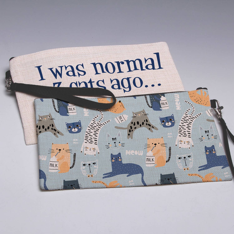 Cats print fabric pouch with light pink top flap and black drawstring closure