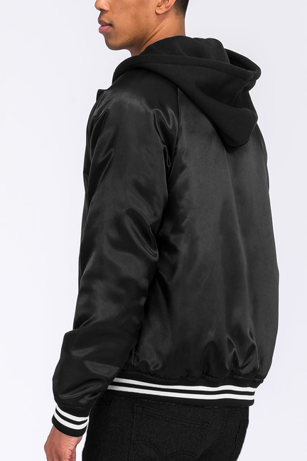 Black satin hooded varsity jacket from side, with attached hood and striped ribbed hem