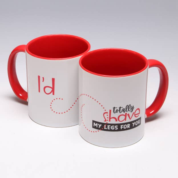 White ceramic mug with red interior and handle, printed with leg-shaving message and “My legs for you”