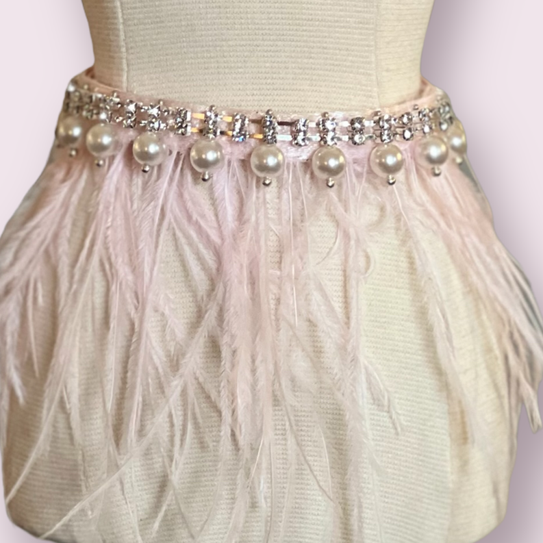 Sparkly glam collar with rhinestones and round pearl drops over white feather fringe