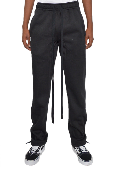 Black cotton fleece sweatpants with elastic waistband, toggle drawstrings, cuffed hems