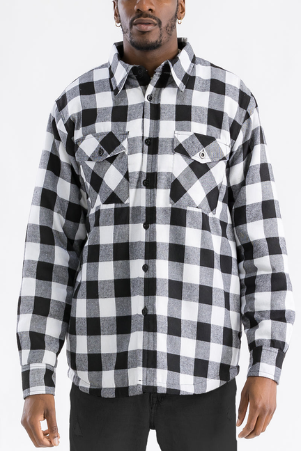 Quilted flannel button-up shirt in black and white buffalo plaid with chest pockets