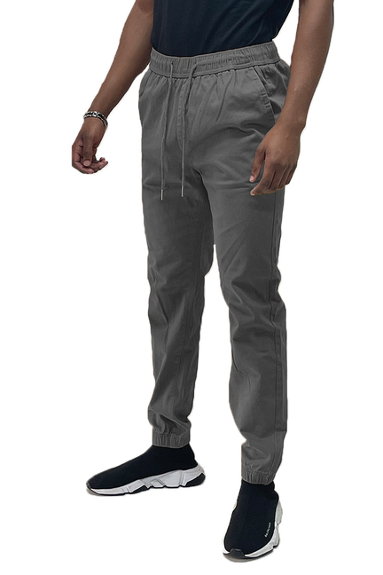 Solid jogger pants in dark gray with elastic cuffs and drawstring waistband