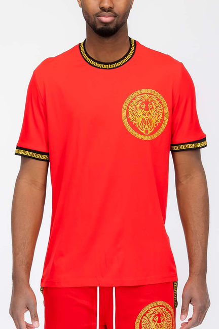 Red lion-head T-shirt with gold circular chest graphic and matching gold trim at collar and cuffs
