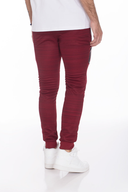 Burgundy marble jogger pants, side view, slim taper with ribbed ankle cuffs