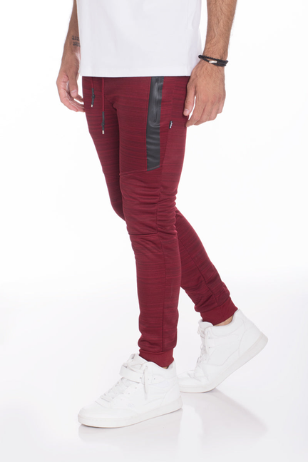 Burgundy marble jogger pants with gray vertical accents and slim taper, ribbed cuffs