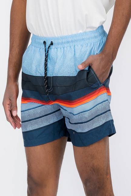 Men's striped swim shorts in light blue and navy with orange-red waistband stripe detail