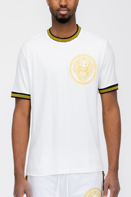 White lion head T-shirt with gold graphic and black-and-gold trim at collar and cuffs