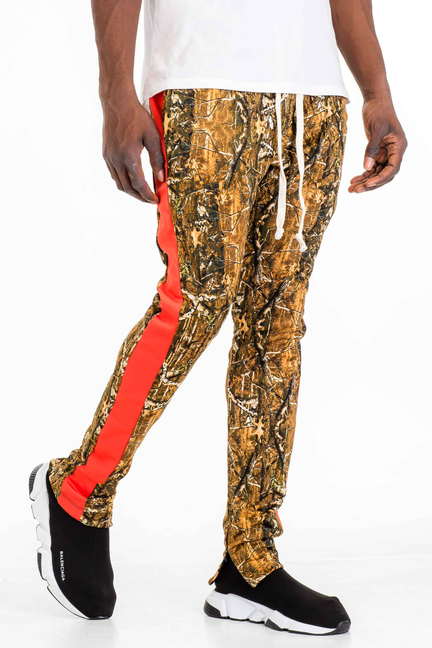Riley Hunter camo track pants with orange side stripe, full-length joggers