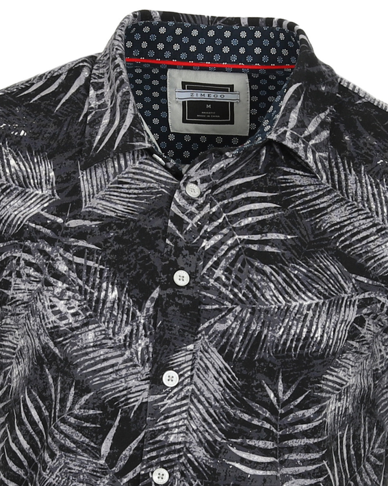 Men's short-sleeve button-down shirt, dark with white palm leaf print and white buttons.