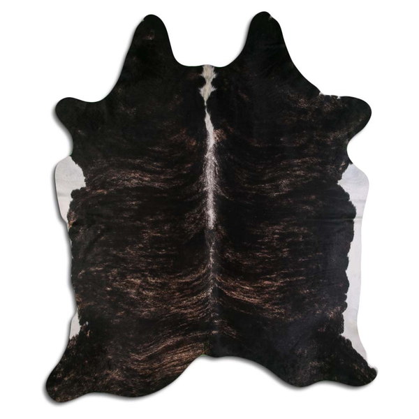 Natural cowhide rug with dark hide and lighter belly panel, irregular shape