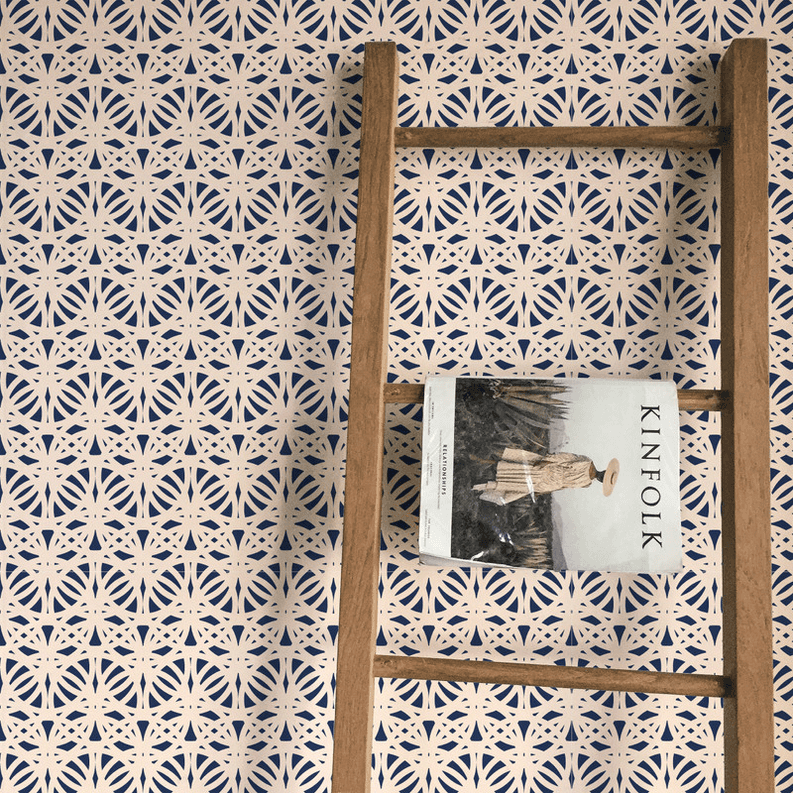 Peel-and-stick wallpaper with navy and cream medallion pattern and sample card