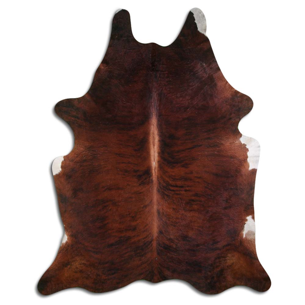 Medium brindle cowhide rug with natural hair, irregular hide pattern