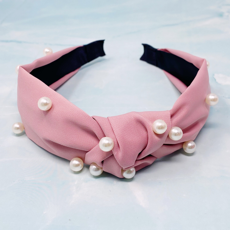 Pink pearl headband with twisted knot and full band of round pearl beads