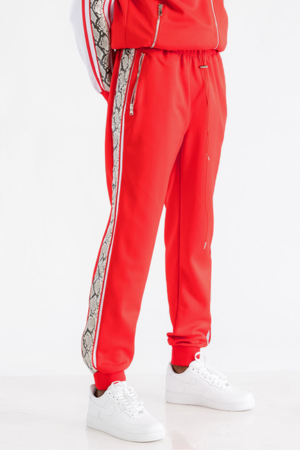 Red snake-side jogger pants with drawstring waist and cuffed ankles
