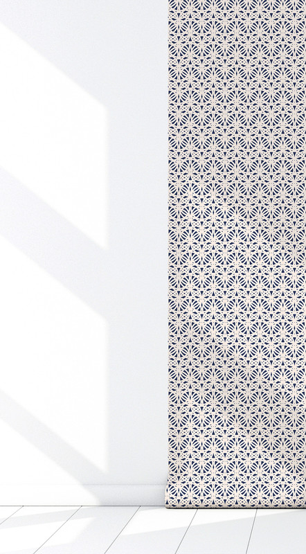 Peel-and-stick wallpaper with navy and white geometric medallion lattice pattern on wall
