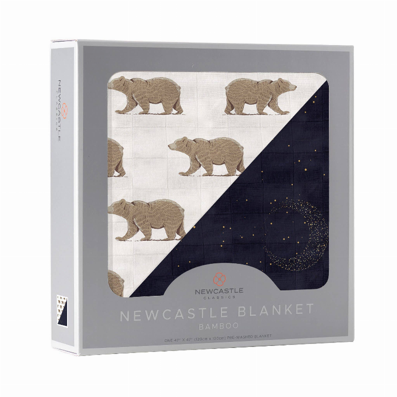 Bamboo blanket shown in gift box, rhino print with navy speckled crescent