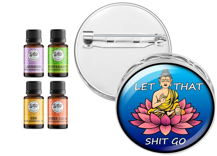 Round silver pin brooch diffuser with blue Buddha lotus graphic and included oil bottles.