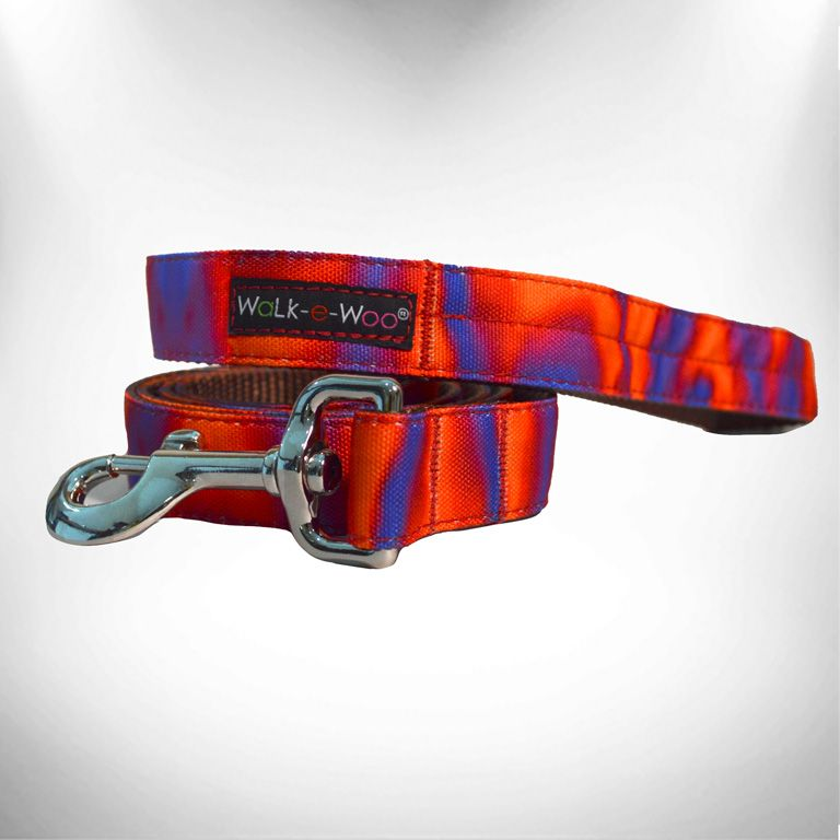 Orange and blue patterned dog leash with metal buckle and spring clasp