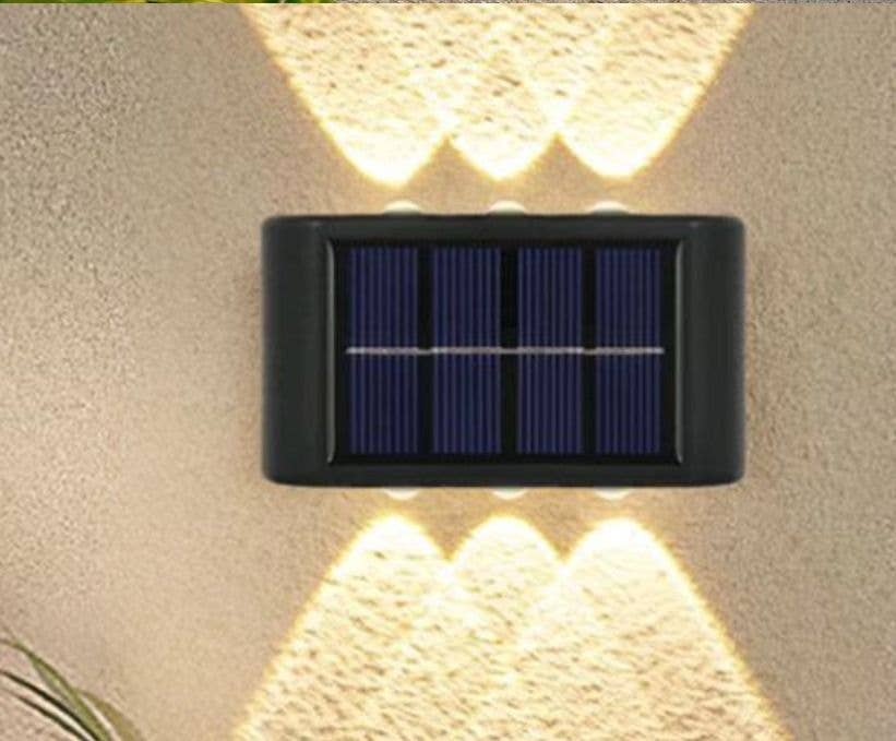 Black solar wall LED light with rectangular solar panel and built-in LEDs
