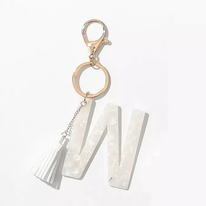 White initial key chain with tassel and letter W charm