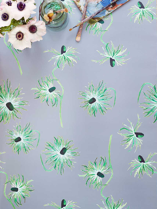 Wallpaper with green dandelion pattern on light blue background