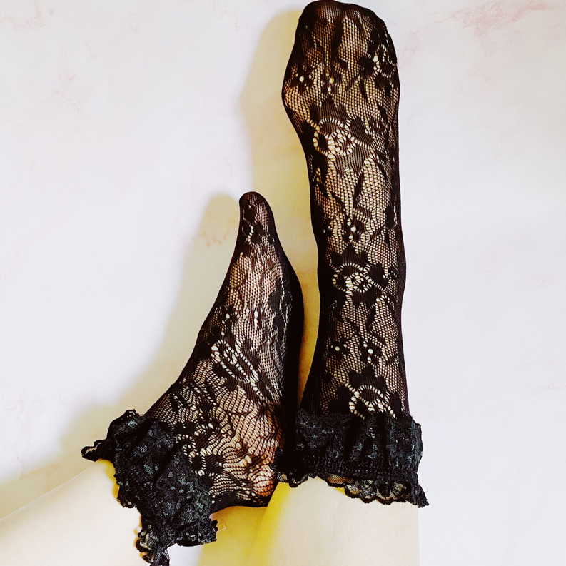 Dark brown lace socks with openwork floral pattern and black ruffled cuffs