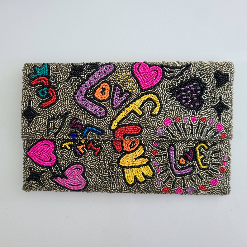 Embroidered clutch/crossbody bag with multicolor beaded animal and heart pattern