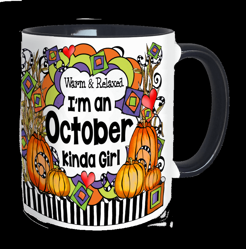 White ceramic mug with colorful October Girl graphic and text, black handle