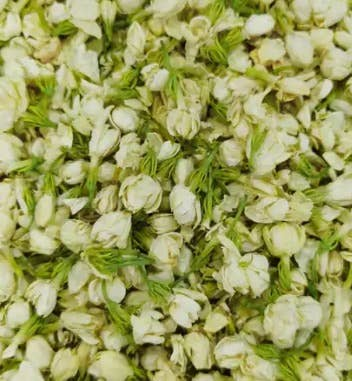 Dried jasmine flowers and petals, pale green and cream pieces