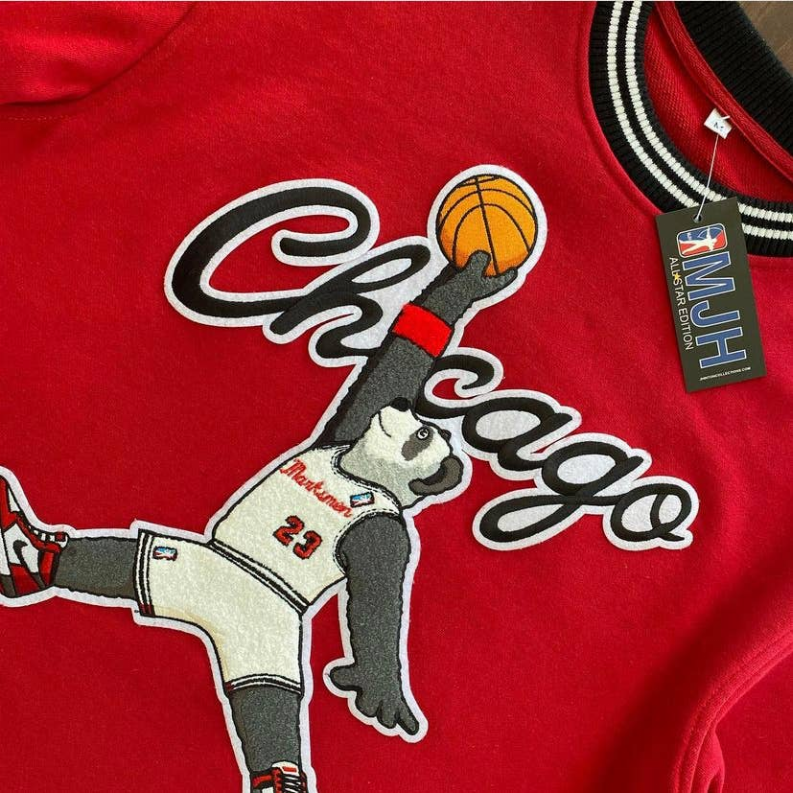 Red sweatshirt front with Chicago Allstar basketball player logo graphic
