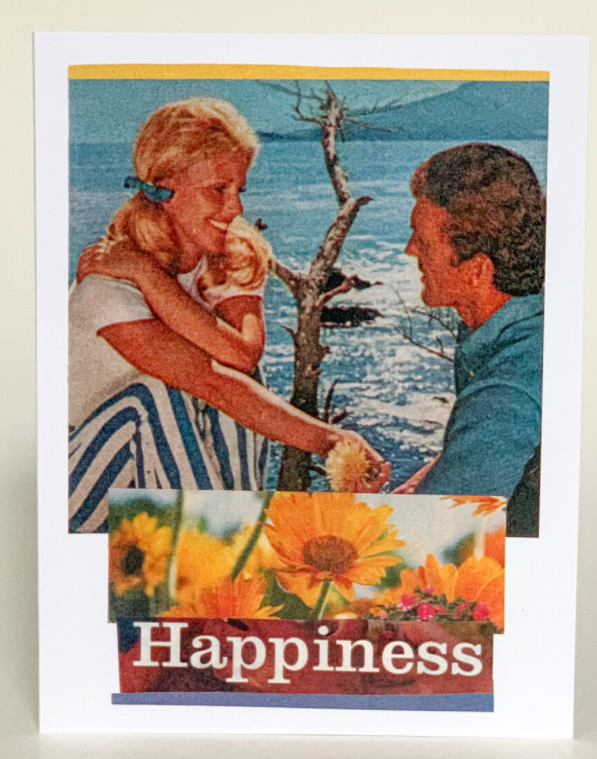 Greeting card front shows “Happiness” text over floral flowers and beach family.