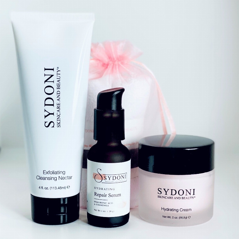 Hydrating skincare set: exfoliating cleansing nectar, repair serum, and hydration cream jars
