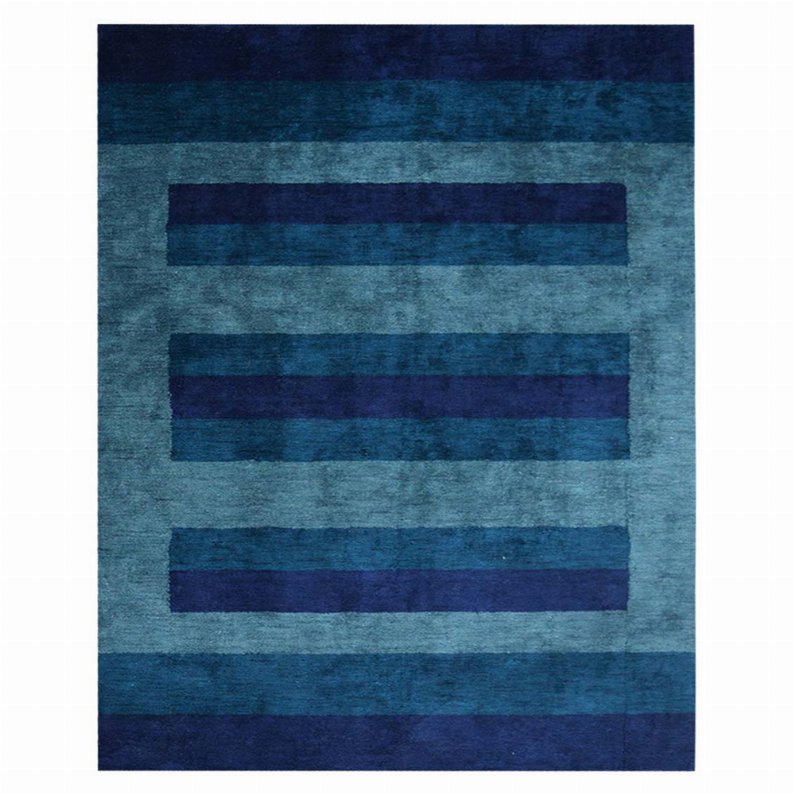 Area rug with stacked teal and navy bar stripes, centered layout