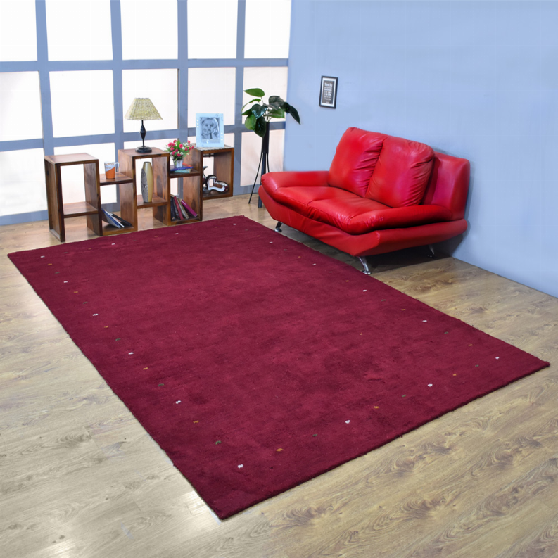 Maroon speckled contemporary area rug with short pile, rectangular layout