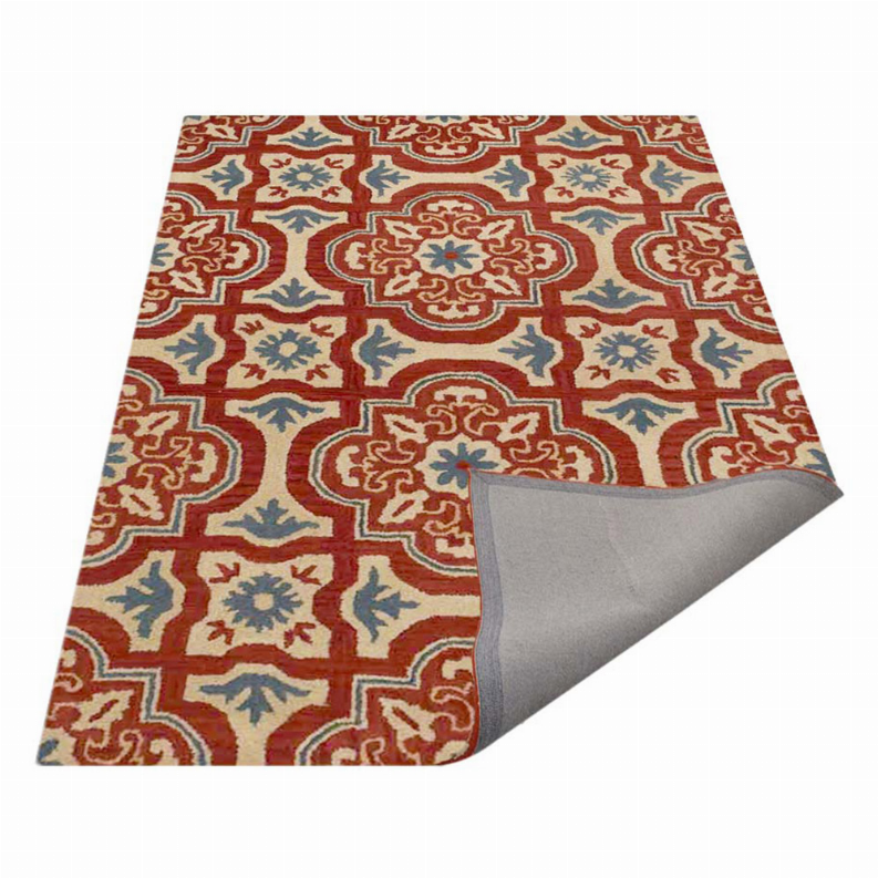 Floral area rug with red, blue, and cream medallion design; corner shows gray underside