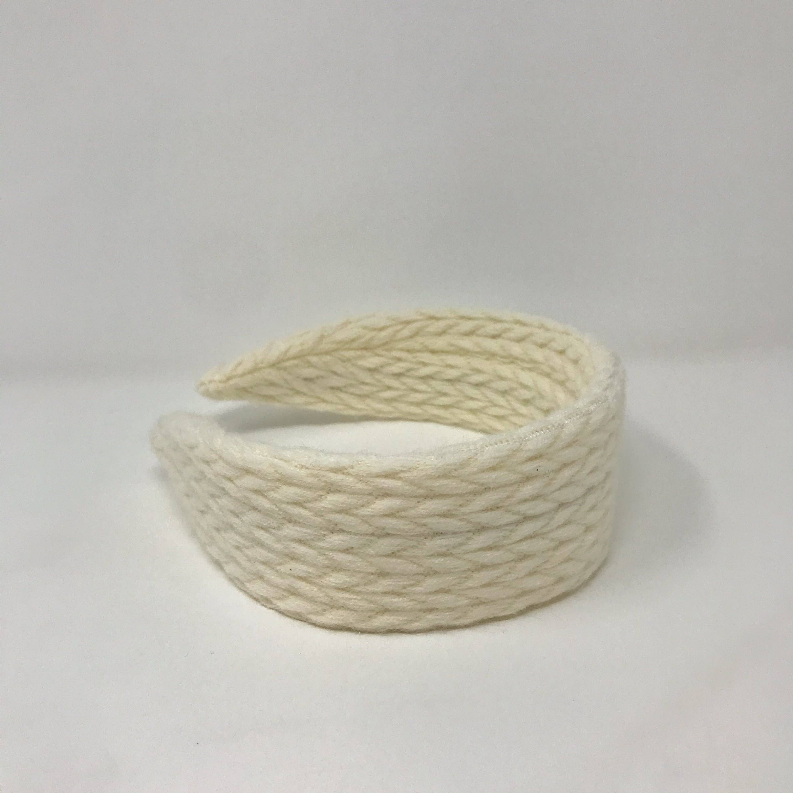 Wide cable-knit headband in off-white, braided weave, curved fit