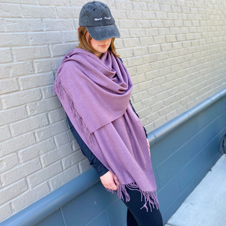 Cashmere blend scarf in lavender, solid knit with fringed hem end visible
