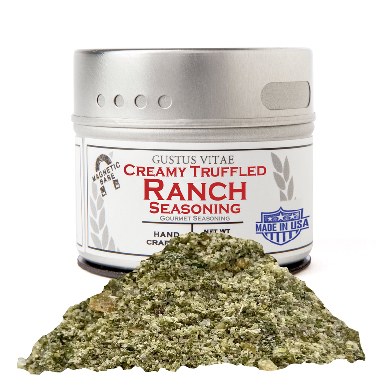 Creamy truffled ranch seasoning jar with green seasoning flakes on top