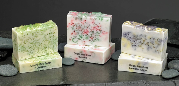 Goat's milk soap bars: tuberose, plumeria, and lavender lemon, with matching boxes