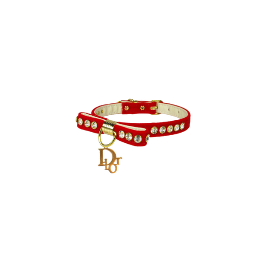 Red velvet dog collar with rhinestone trim, gold D-ring, and Dior charm