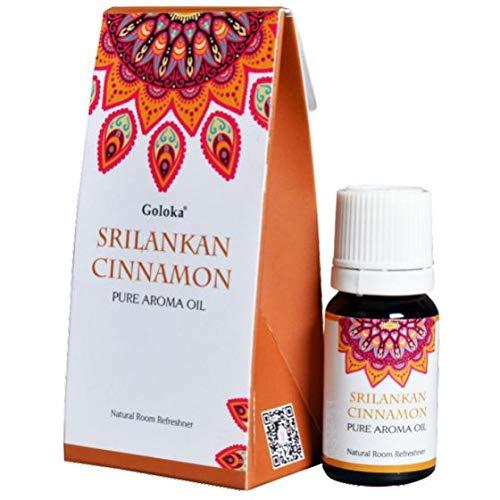 Goloka Srilankan Cinnamon oil bottle beside retail box, 10 ml glass with white cap