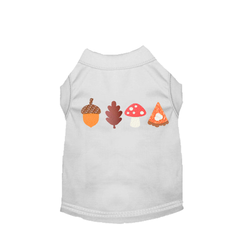 White dog fall shirt with acorn, leaf, mushroom, and pie slice graphic