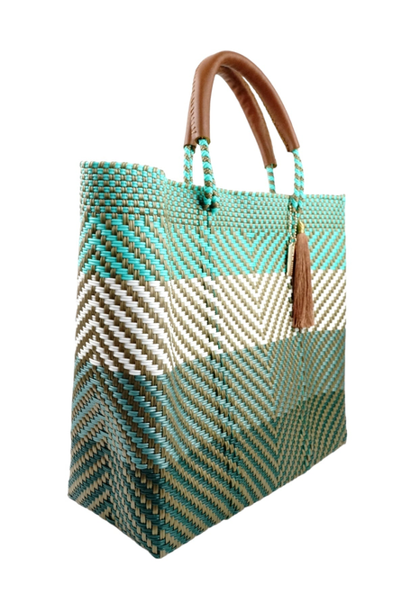 Chevron resort tote bag in teal and cream with brown handles and tassel pocket