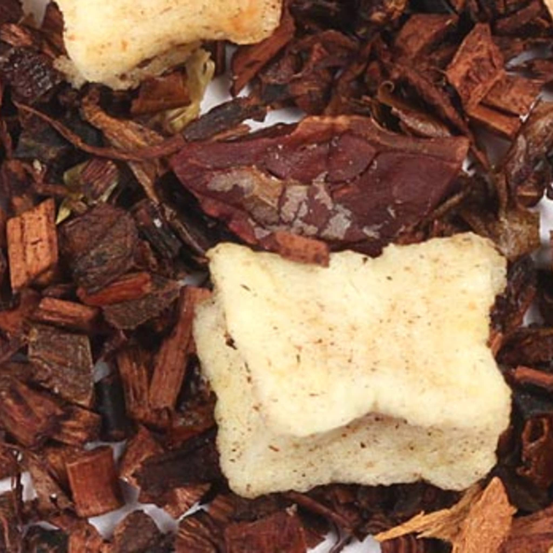 Honeybush banana nut tea blend, close-up of dark leaves with pale dried pieces
