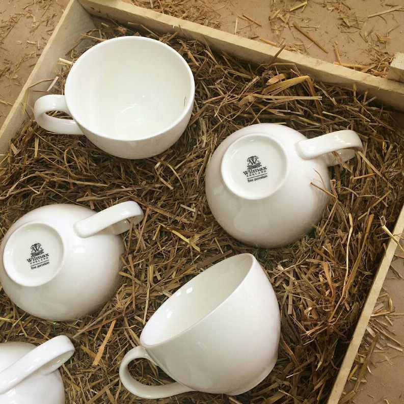 Set of 6 white cappuccino cups and saucers, multiple cups with matching saucers.