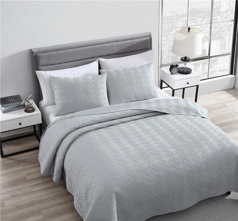 Gray queen duvet set with two shams and matching bedspread
